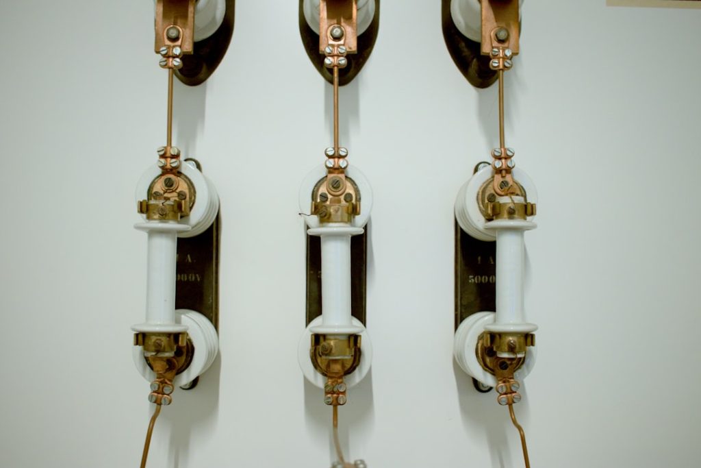 Photo copper piping wall sconce