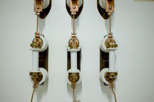 Photo copper piping wall sconce